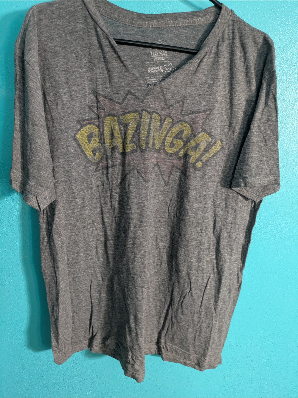 Big Bang Theory Clothing Gray V-Neck 'BAZINGA!' Tee with Yellow Accent